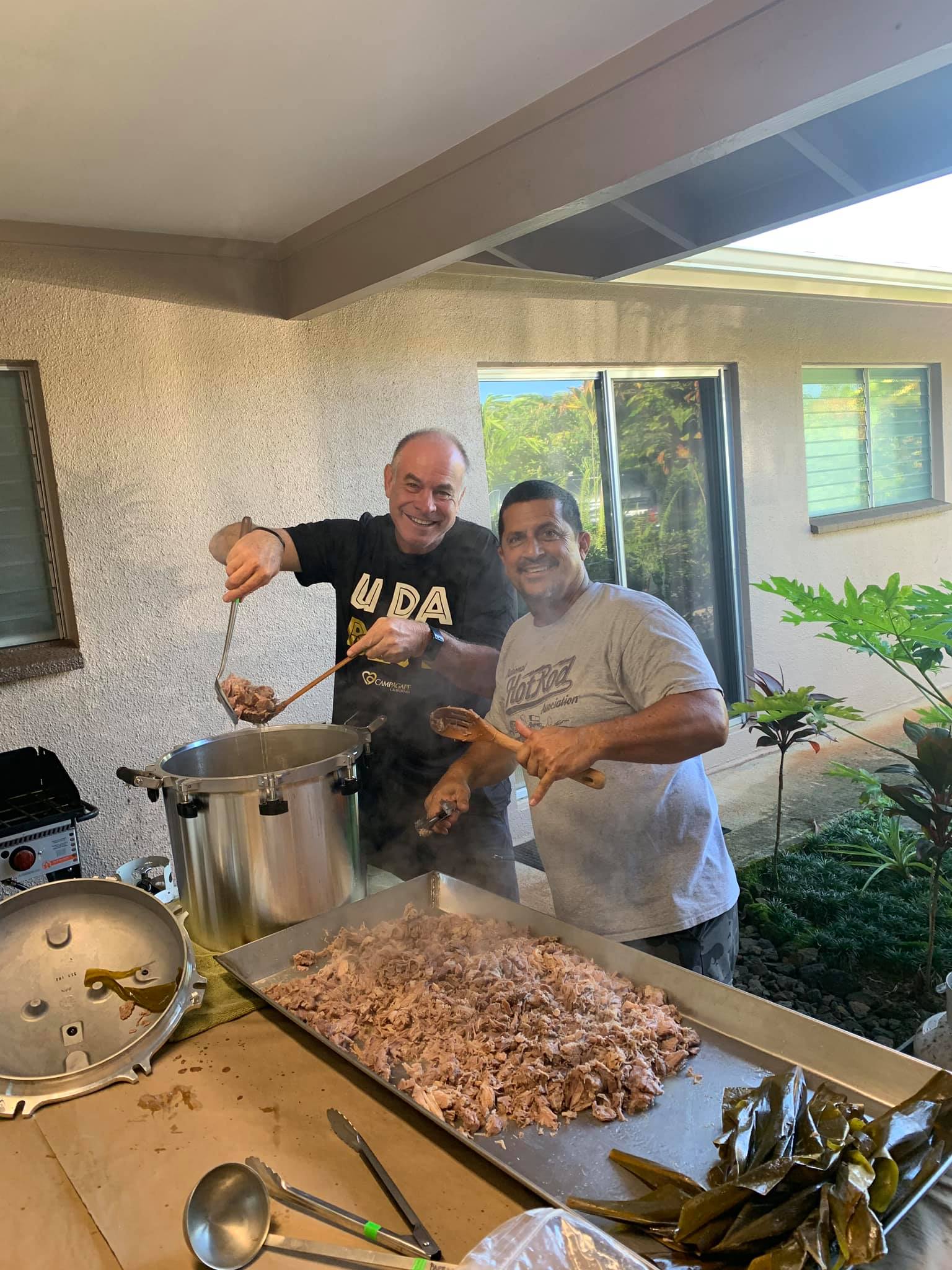 Mayor cooking kalua pig